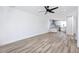 Open living room with hardwood floors and modern kitchen at 1308 E Columbus Dr # 1, Tampa, FL 33605