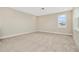 Spacious bedroom with neutral walls and carpet at 32298 Wetland Bird Vw, San Antonio, FL 33576