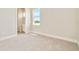Bedroom with an ensuite bathroom and a view at 32298 Wetland Bird Vw, San Antonio, FL 33576