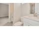 Clean bathroom with white vanity, toilet and shower at 32298 Wetland Bird Vw, San Antonio, FL 33576