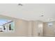 Upstairs loft bedroom with multiple windows at 32298 Wetland Bird Vw, San Antonio, FL 33576