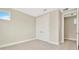 Simple bedroom with double door closet and carpet at 32298 Wetland Bird Vw, San Antonio, FL 33576