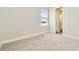 Bedroom with ensuite bathroom and window view at 32298 Wetland Bird Vw, San Antonio, FL 33576