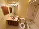 Clean bathroom with shower/tub combo, toilet and vanity at 1567 Patton Dr # 1567, Dunedin, FL 34698