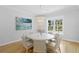 Cozy dining room featuring a round table with seating for six and a decorative chandelier at 814 S Bayside Dr, Tampa, FL 33609