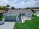 Aerial view of a charming single story home with a nicely landscaped yard at 1508 Fort Duquesna Dr, Sun City Center, FL 33573