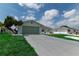 Single story home with light green garage door and nicely landscaped lawn at 1508 Fort Duquesna Dr, Sun City Center, FL 33573