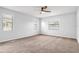 Large bedroom with neutral walls and carpet flooring at 1508 Fort Duquesna Dr, Sun City Center, FL 33573