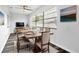 Spacious dining area with wood-look flooring and neutral color palette at 1508 Fort Duquesna Dr, Sun City Center, FL 33573
