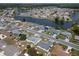 Aerial view showcasing a peaceful lakefront community at 1508 Fort Duquesna Dr, Sun City Center, FL 33573