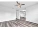 Spacious living room with wood-look flooring and neutral color palette at 1508 Fort Duquesna Dr, Sun City Center, FL 33573