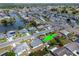 Aerial view of a single Gathering home in a quiet residential neighborhood at 1508 Fort Duquesna Dr, Sun City Center, FL 33573