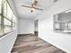Bright dining area with wood-look flooring and large window at 1508 Fort Duquesna Dr, Sun City Center, FL 33573