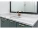 Green vanity with quartz countertop and gold hardware at 1308 E Columbus Dr # 2, Tampa, FL 33605