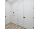 Bright hallway with vinyl flooring and white doors at 1308 E Columbus Dr # 2, Tampa, FL 33605