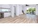 Spacious living room with sliding glass doors to balcony at 1308 E Columbus Dr # 4, Tampa, FL 33605
