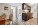 Cozy kitchen with dark wood cabinets, stainless steel appliances, and modern finishes, offering a functional space at 4304 W Laurel St, Tampa, FL 33607