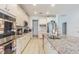 Modern kitchen featuring granite countertops and ample cabinetry at 12964 Willow Grove Dr, Riverview, FL 33579