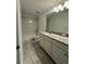 Bathroom with granite countertop, tub, and shower at 12964 Willow Grove Dr, Riverview, FL 33579