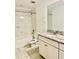 Bathroom with granite countertop, tub, and shower at 12964 Willow Grove Dr, Riverview, FL 33579