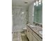 Bathroom with double vanity, granite countertop, and bathtub at 12964 Willow Grove Dr, Riverview, FL 33579