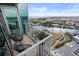 Modern balcony with seating area overlooking a picturesque city and river at 777 N Ashley Dr # 2601, Tampa, FL 33602