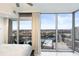 Bright primary bedroom with floor to ceiling windows and city views at 777 N Ashley Dr # 2601, Tampa, FL 33602