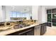 Modern kitchen with granite countertops and stainless steel appliances at 777 N Ashley Dr # 2601, Tampa, FL 33602