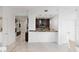 Modern kitchen with breakfast bar and dark brown cabinets at 777 N Ashley Dr # 2601, Tampa, FL 33602
