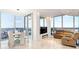 Elegant living room with floor-to-ceiling windows and city views at 777 N Ashley Dr # 2601, Tampa, FL 33602