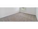 Cozy bedroom featuring neutral walls and carpeted floors at 4939 Eagle Rock Dr, Wimauma, FL 33598
