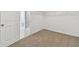 Spacious walk-in closet with wall-to-wall shelving and carpeting at 4939 Eagle Rock Dr, Wimauma, FL 33598