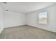Bright bedroom with window and neutral wall colors at 4939 Eagle Rock Dr, Wimauma, FL 33598