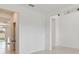 Open concept living area with high ceilings and tile flooring at 4939 Eagle Rock Dr, Wimauma, FL 33598