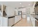Modern kitchen with stainless steel appliances and granite countertops at 4939 Eagle Rock Dr, Wimauma, FL 33598