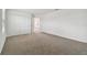 Spacious bedroom with double door closet and carpeting at 4939 Eagle Rock Dr, Wimauma, FL 33598