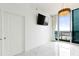 Bright living room with city views and a large TV at 777 N Ashley Dr # 2601, Tampa, FL 33602
