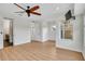 Spacious bedroom featuring neutral tones, hardwood floors, and a unique circular window at 111 N Albany Ave # 16, Tampa, FL 33606