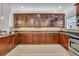 Gourmet kitchen featuring custom cabinetry, granite countertops, and stainless steel appliances for a luxury cooking experience at 111 N Albany Ave # 16, Tampa, FL 33606