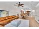 Inviting living room boasts modern decor and an open floor plan leading into the kitchen and dining areas at 111 N Albany Ave # 16, Tampa, FL 33606