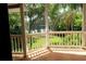 Covered porch overlooking the water at 16308 Rock Lake Dr, Odessa, FL 33556