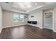 Bright bonus room with large windows and wood-look floors at 10320 Stallion Fields Way, Tampa, FL 33647