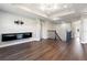 Spacious loft area with wood-look floors and a brick feature wall at 10320 Stallion Fields Way, Tampa, FL 33647