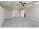 Spacious bedroom with access to hall bathroom and upper floor at 10320 Stallion Fields Way, Tampa, FL 33647