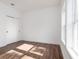 Bright bedroom with wood floors and sliding door closet at 17423 Metcalf Ave, Port Charlotte, FL 33954