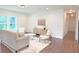 Spacious living room with access to hallway at 17423 Metcalf Ave, Port Charlotte, FL 33954