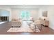 Light and airy living room with hardwood floors and comfortable seating at 17399 Masten Ave, Port Charlotte, FL 33954