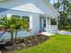 Cute Florida home with light blue siding, white trim, and a covered porch at 18078 Spartonvail Ave, Port Charlotte, FL 33954