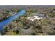 Aerial view of waterfront property with homes and marina at 6605 N Boulevard, Tampa, FL 33604