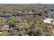 Aerial view showcasing waterfront property and surrounding area at 6605 N Boulevard, Tampa, FL 33604